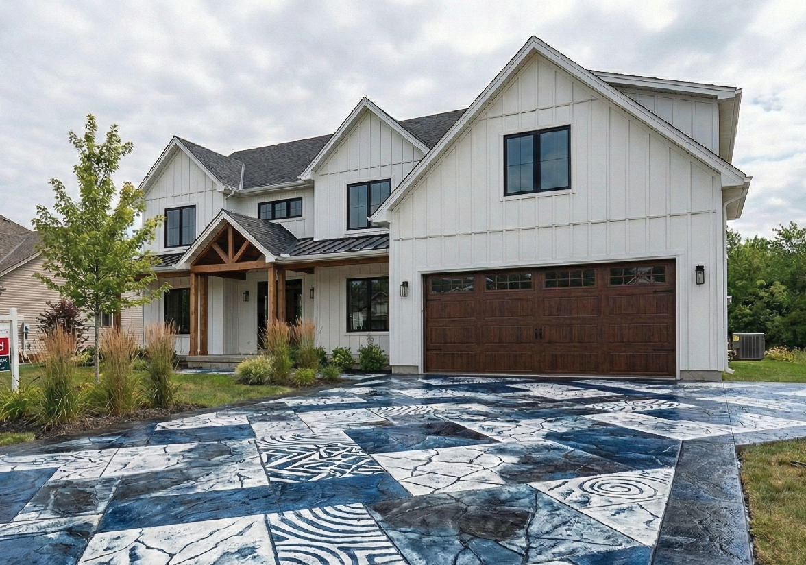 Bobcat excavator breaking up old cracked concrete for removal